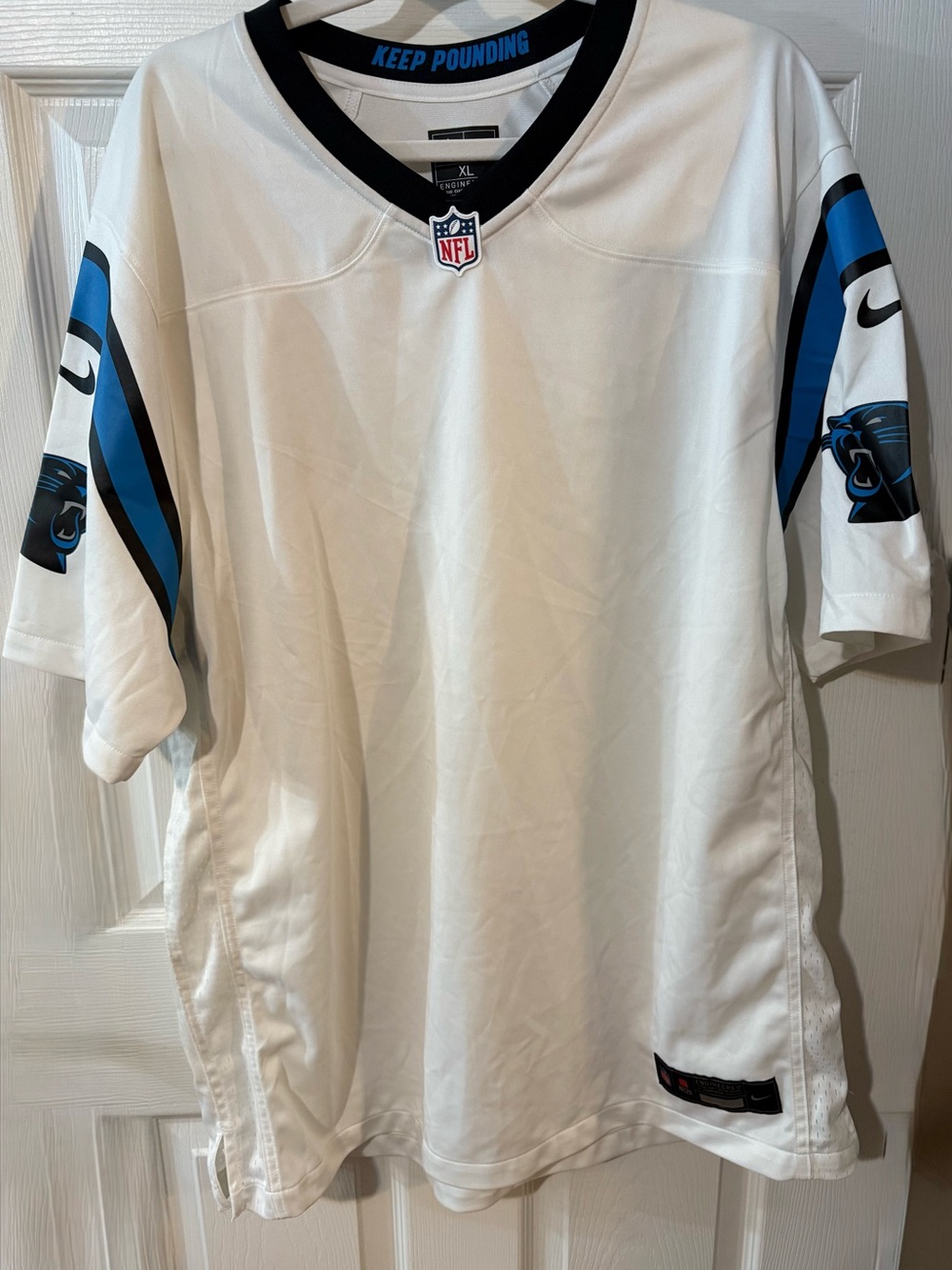 NFL White Jersey with Black Collar and Blue 'Keep Pounding' Neckline
